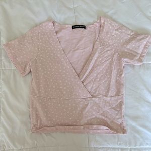 Light baby pink crop fitted wrap top